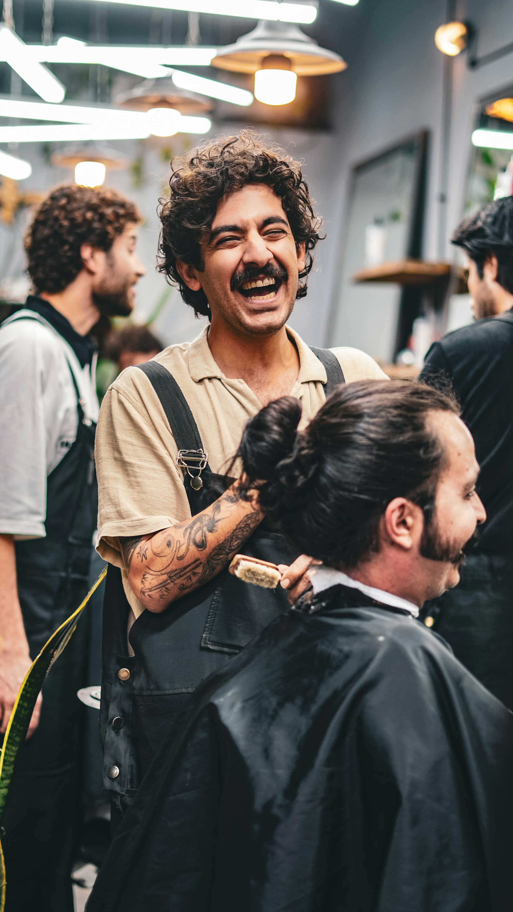 A laugh in the chair mid-cut